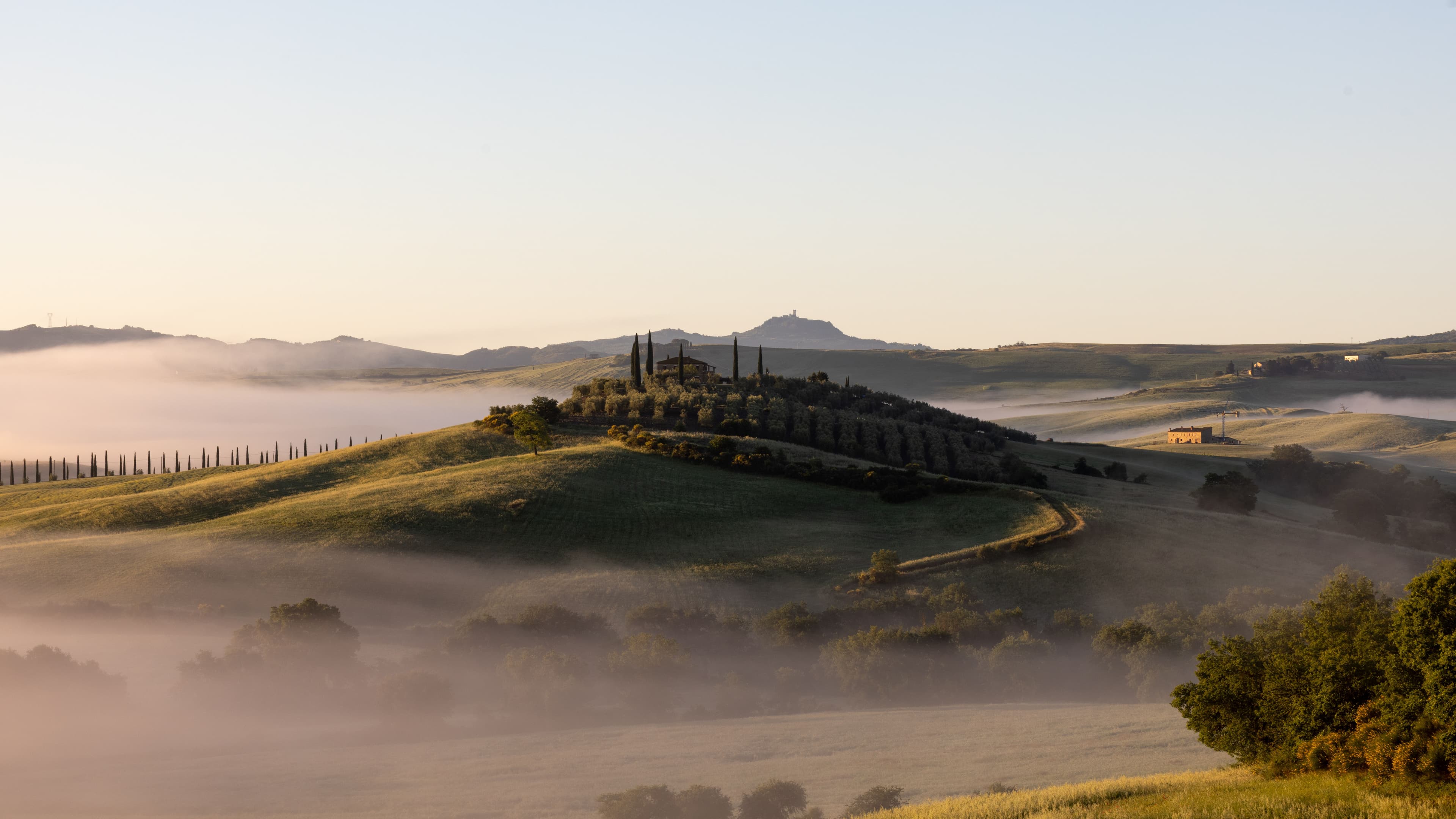 Siena and the rolling landscape of the Val d’Orcia